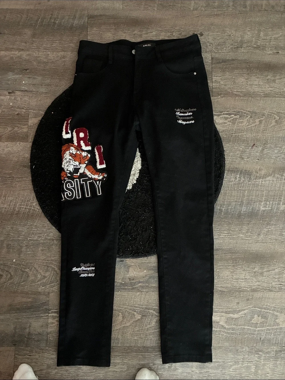 AMIRI Black Skinny Jeans with Embroidered Tiger and Varsity Patch
